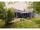 Charming backyard featuring a patio, gazebo, and landscaped garden at 4810 Shea Ct, Monroe, NC 28110