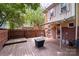 Spacious back deck with a brick house, perfect for entertaining and enjoying the outdoors at 510 N Alexander St, Charlotte, NC 28202