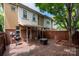 Inviting back deck with a grill, perfect for barbecues and enjoying outdoor living at 510 N Alexander St, Charlotte, NC 28202