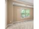Bright and airy bedroom with large window and neutral carpet at 510 N Alexander St, Charlotte, NC 28202