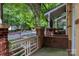Covered brick front porch with views of a quiet residential street at 510 N Alexander St, Charlotte, NC 28202