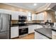 Kitchen featuring stainless steel appliances, modern oven, and ample cabinet space at 510 N Alexander St, Charlotte, NC 28202