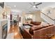 Open concept living space showcasing hardwood floors, fireplace, and spacious seating at 510 N Alexander St, Charlotte, NC 28202
