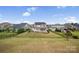 Fenced backyard with a patio, hot tub, vegetable garden, and a play area at 528 Rock Skip Way, Fort Mill, SC 29708