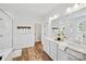 Bright bathroom with a double sink vanity, a walk-in shower and natural light at 528 Rock Skip Way, Fort Mill, SC 29708
