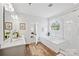 Bathroom with tub, walk-in shower, modern vanity, and plenty of natural light at 528 Rock Skip Way, Fort Mill, SC 29708