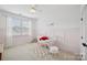 This bedroom has a crib, a fan, and white walls at 528 Rock Skip Way, Fort Mill, SC 29708