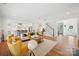 Open-concept living room featuring hardwood floors and plenty of natural light at 528 Rock Skip Way, Fort Mill, SC 29708