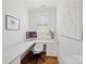Bright office with a built-in desk, drawers, and a window for natural light at 528 Rock Skip Way, Fort Mill, SC 29708