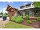Elegant clubhouse with stone and wood accents, complemented by lush landscaping and manicured grounds at 528 Rock Skip Way, Fort Mill, SC 29708