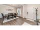 Dining room with hardwood floors, decorative lighting, and stylish furniture at 6070 Trinity Crossing Cir, Kannapolis, NC 28081