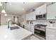Well-equipped kitchen featuring a large island, stainless steel appliances, and ample counter space at 6070 Trinity Crossing Cir, Kannapolis, NC 28081