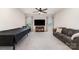 Spacious living room featuring neutral colored walls, a sofa, a TV, and a pool table at 6070 Trinity Crossing Cir, Kannapolis, NC 28081