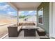 Screened-in back patio with comfortable seating and great views of the backyard at 6070 Trinity Crossing Cir, Kannapolis, NC 28081