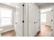 View of the hallway and storage closets leading into the bathroom at 640 Central Nw Dr, Concord, NC 28027