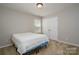 Neutral bedroom features carpet, and double door closet at 726 Centennial St, Gastonia, NC 28056