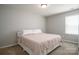 Bedroom with neutral walls, carpet, and a queen size bed at 726 Centennial St, Gastonia, NC 28056