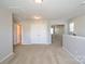Bonus room shows plush carpeting, neutral paint colors, and closet doors at 726 Centennial St, Gastonia, NC 28056