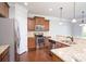 Kitchen featuring stainless steel appliances, granite countertops, tile backsplash, and hardwood floors at 726 Centennial St, Gastonia, NC 28056