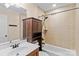 Well-lit bathroom with built-in storage and a shower-tub combination at 7887 Mountain Shore Dr, Sherrills Ford, NC 28673