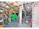 Unfinished basement with exposed brick walls and duct work, great for storage or workshop space at 803 N Walnut St, Kannapolis, NC 28081