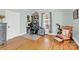 Bedroom features hardwood flooring and flexible space for study or relaxing at 803 N Walnut St, Kannapolis, NC 28081