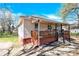 Well-maintained single-story home with a inviting front porch and landscaped yard, perfect for outdoor living at 803 N Walnut St, Kannapolis, NC 28081