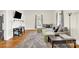 Bright and airy living room with hardwood floors, a comfortable sectional sofa, and stylish decor at 803 N Walnut St, Kannapolis, NC 28081