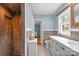 Bathroom featuring dual sinks, new fixtures and a step-in shower at 828 N 6Th St, Albemarle, NC 28001