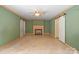Inviting living room features a traditional fireplace and sliding barn doors at 828 N 6Th St, Albemarle, NC 28001
