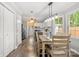 Open-concept kitchen and dining area with modern appliances and plenty of natural light at 8819 Kishorn Ct, Charlotte, NC 28215