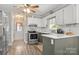 Well-appointed kitchen featuring stainless steel appliances, granite countertops, and ample cabinet space at 8819 Kishorn Ct, Charlotte, NC 28215