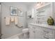 Bathroom featuring white vanity, marble countertops, and convenient accessibility features at 901 Southland Rd, Huntersville, NC 28078