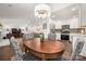 Bright open floor plan showcasing the dining room, kitchen with stainless appliances, and comfortable living area at 901 Southland Rd, Huntersville, NC 28078