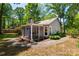 View of the home from the yard featuring a screened in porch and exterior siding at 901 Southland Rd, Huntersville, NC 28078