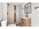 Updated bathroom with modern vanity, stylish tiles, and walk-in shower at 906 Church St, Kings Mountain, NC 28086