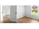 Spacious bedroom with hardwood floors, a window, and neutral decor at 906 Church St, Kings Mountain, NC 28086