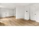 Bright living room featuring multiple doorways and neutral flooring at 906 Church St, Kings Mountain, NC 28086