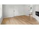 Bright, spacious living room featuring neutral paint, modern flooring, and an entryway to the hallway at 906 Church St, Kings Mountain, NC 28086
