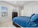 Bedroom featuring a large window, modern design, and a TV atop a dresser at 9823 Oaklawn Nw Blvd, Huntersville, NC 28078