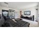 Cozy living room with large display case and entertainment setup for movie nights at 9823 Oaklawn Nw Blvd, Huntersville, NC 28078