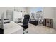 Office space with a large desk, chair, a window, and trophy shelving at 9823 Oaklawn Nw Blvd, Huntersville, NC 28078