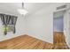 A bright bedroom with hard wood floors is illuminated by natural light at 1005 Caldon Dr, Stanley, NC 28164