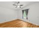 Cozy bedroom with hardwood flooring, ceiling fan, and plenty of natural light at 1005 Caldon Dr, Stanley, NC 28164