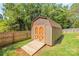 Outdoor storage shed with double doors and a ramp for easy access at 1005 Caldon Dr, Stanley, NC 28164