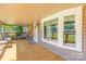 Inviting porch offers ample seating and views of the surrounding greenery at 1005 Caldon Dr, Stanley, NC 28164