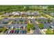 Aerial view of community with swimming pool, clubhouse, parking, and green spaces at 1026 Kirby Dr, Fort Mill, SC 29715