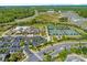Complete aerial view of neighborhood amenities including pools, tennis courts, clubhouse, and parking area at 1026 Kirby Dr, Fort Mill, SC 29715