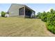 A lush green backyard that complements the home's aesthetic, perfect for outdoor activities at 1026 Kirby Dr, Fort Mill, SC 29715