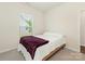 Simple bedroom with a comfortable bed, bright window, and plush carpeting at 1026 Kirby Dr, Fort Mill, SC 29715